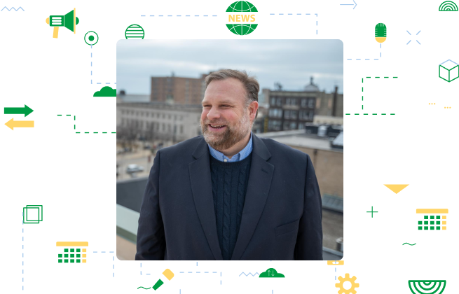 Headshot of a man in a suit, outdoors with city buildings in the background, surrounded by graphic elements.